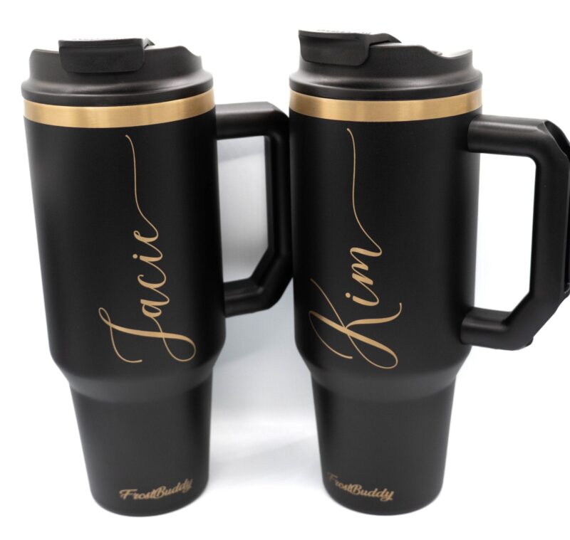 Two personalized Frost Buddy Thicc Buddy tumblers engraved with names