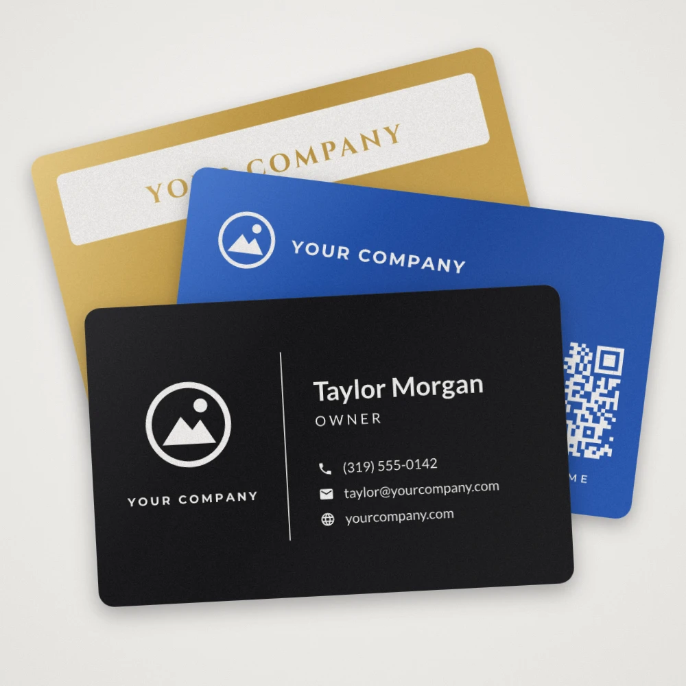 Engraved metal business cards in black, blue and gold